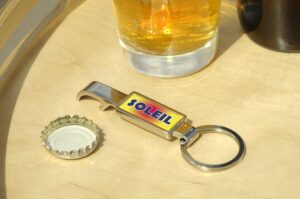 PORTE CLES DECAPSULEUR